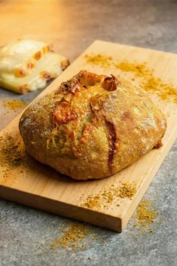 Bread-Cloud-Studio-Ginny-Choy-Cheese-Tomato-Spice-Bread-Whole